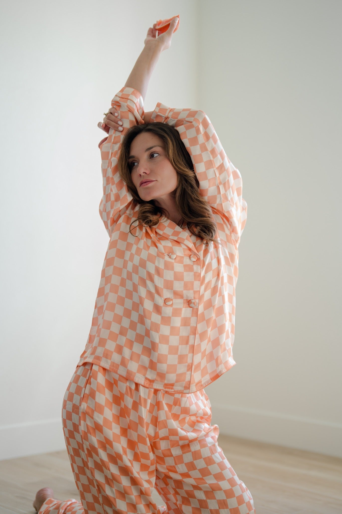 Grapefruit Check raised-arm pose