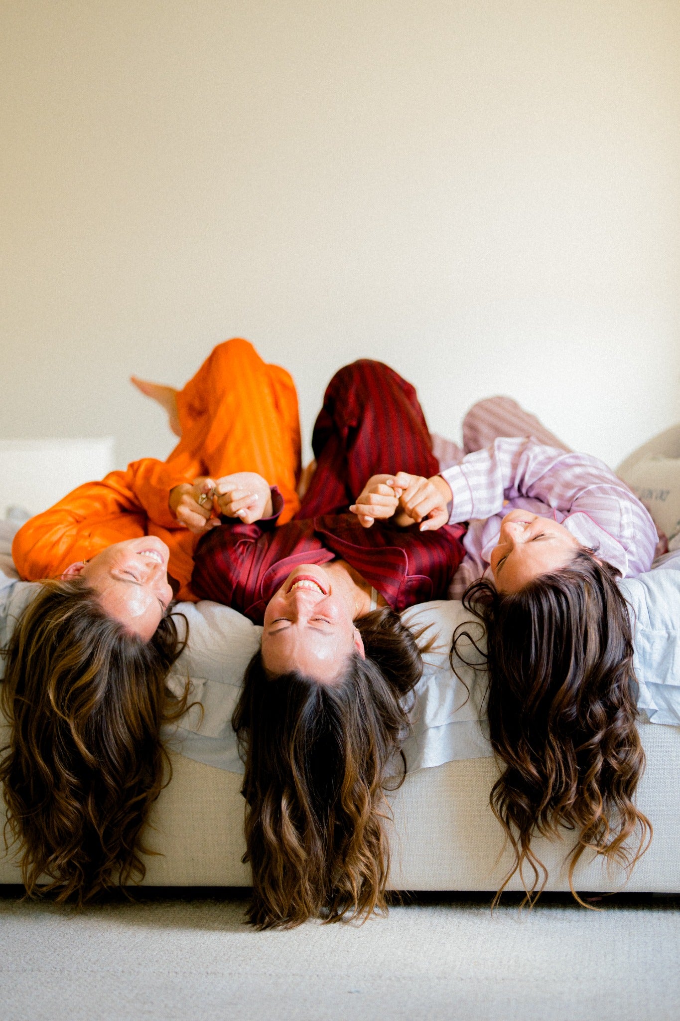 Friends relaxing in colorful Market Wife sleepwear